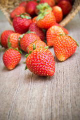 Fresh strawberry on wooden table.