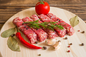 Balkan meat dish. Chivapchichi in raw form.