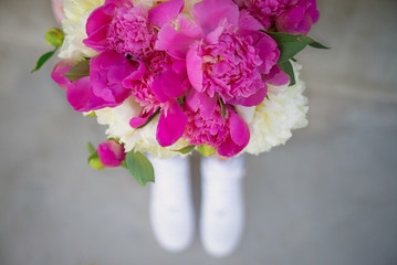 Girl is keeping flowers