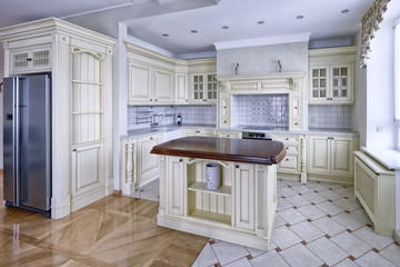 Modern design white kitchen in a spacious apartment.