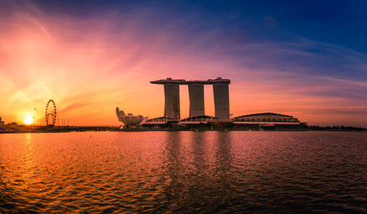 Naklejka premium Sunrise of Singapore Skyline. Singapore`s business distric on blue sky view for marina bay