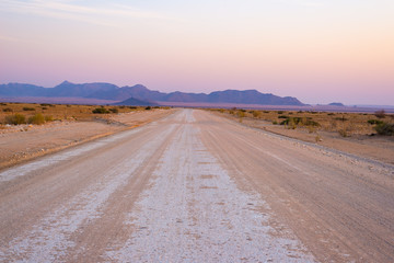 Road trip in the Namib desert, Namib Naukluft National Park, travel destination in Namibia. Travel adventures in Africa.