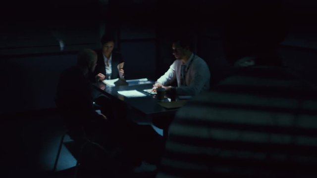  Crime suspect accompanied by lawyer in interview with police detectives