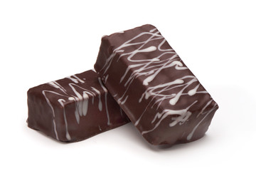 Chocolate candies close-up, isolated on white background