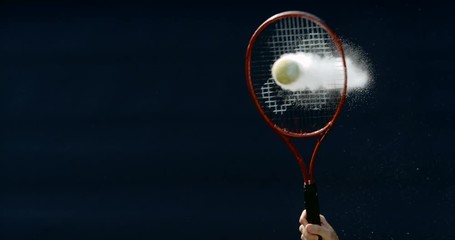  Close up in super slowmo, tennis ball suspended in mid air before being hit
