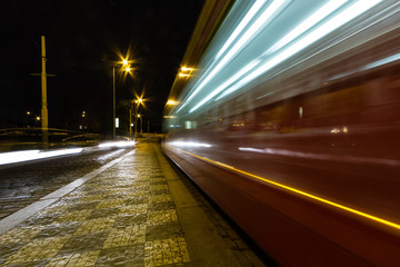 tramway in prague at night in motion