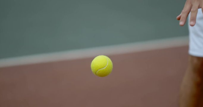  Super slowmo tennis ball suspended in mid air before being hit with racket