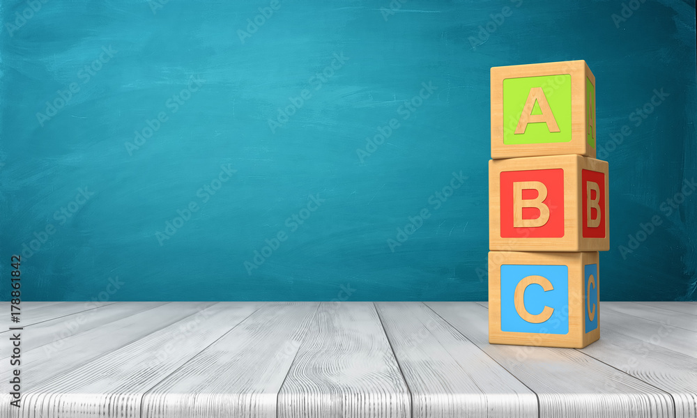 Poster 3d rendering of a three toy blocks standing on a wooden desk in one tower with letters a, b and c on