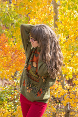 Beautiful woman in Autumn colored nature