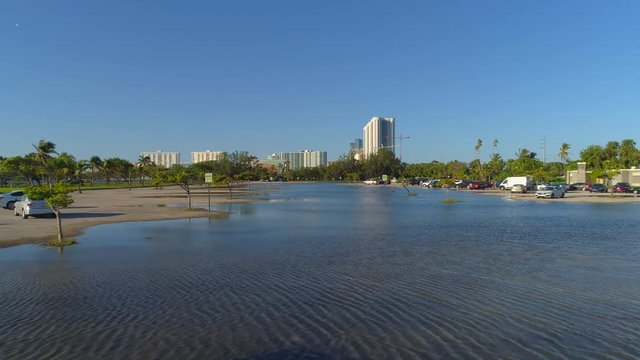 Aerial Miami Beach parking lot flooded climate change