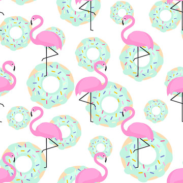 Pink flamingos and donuts trendy seamless pattern on white background. Exotic art background. Design for fabric, wallpaper, textile and decor.