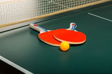 Plakat Table Tennis Rackets and Ball on Table with Net