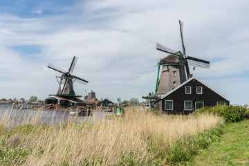 Fototapeta na wymiar Windmill at Zaanse Schans, Netherlands