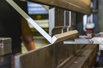 Bending of metal on the machine.