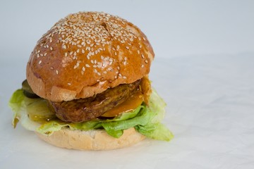 Close-up of hamburger on paper