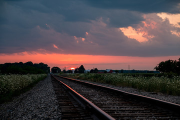 Sunset over Railroad Tracks in Country