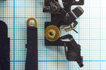 parts old retro film SLR camera on graph paper