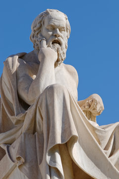 Socrates the greek philosopher statue on blue sky background