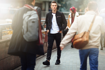 Man walk on the street with cup of coffee