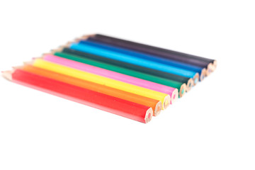 Colored Pencils in a Row, on white Background