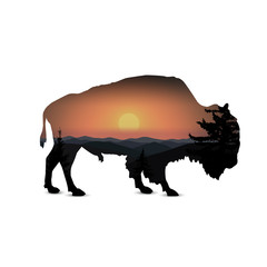 Silhouette of bison with mountain hills.
