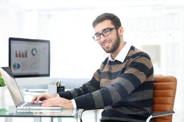 Fototapeta premium successful employee at a Desk