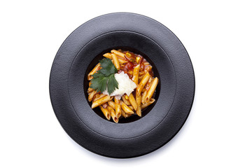 Beautiful macaroni with minced meat and vegetables on a plate. horizontal view from above