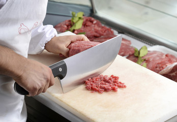 butcher weighs in pieces