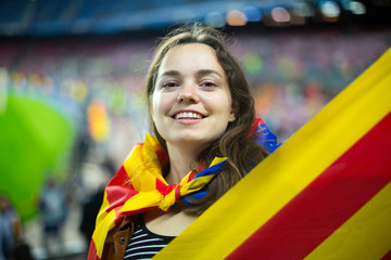 Fototapeta na wymiar Female football fan with flag