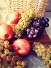 Autumn harvest - sweet apple and grape, tasty fruit 