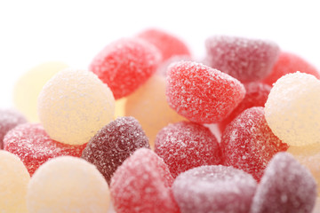 Colorful jelly sugar candies close up isolated in white background