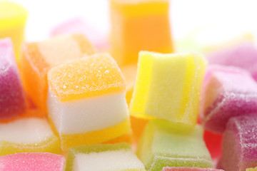 Colorful cube jelly candy isolated in white background