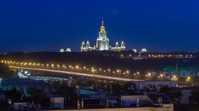Night cityscape view of Moscow timelapse. View from rooftop to the main building of Moscow State University at night