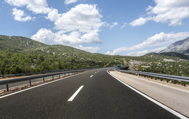 High-speed country road among the mountains.
