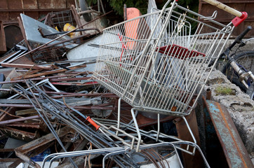 shopping cart in the landfill of ferrous material