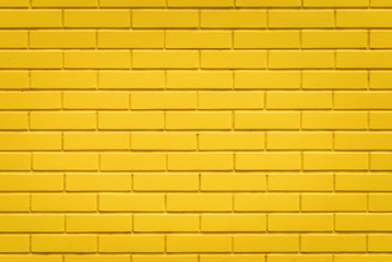 Fototapeta premium Żółty ściana z cegieł tekstury tło, horyzontalny wzór