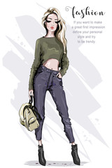 Hand drawn beautiful fashion woman with backpack. Stylish model posing. Blond hair woman in fashion clothes. Stylish outfit. Sketch.