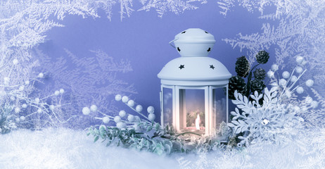 Christmas Eve lantern and decorations background. Picture of a white lantern with lighted candle...
