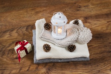 new year lantern standing on winter clothes