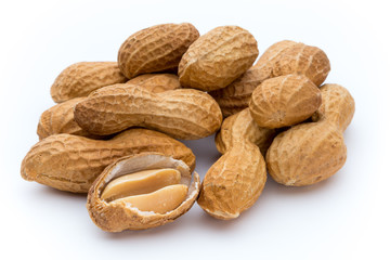 Dried peanuts on the white background.
