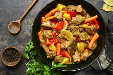 Meat stewed with vegetables.Top view with copy space.