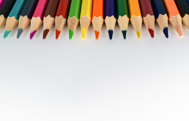 Multicolored pencils isolated on white background