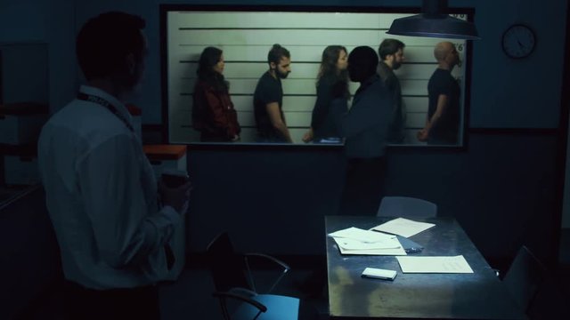  Detectives discussing line up of suspicious characters at police station