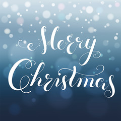 Merry Christmas greeting card. Modern calligraphy lettering. Bokeh background, blurred snowflakes.