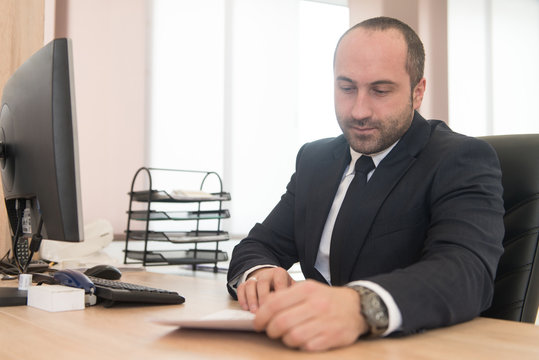 Businessman Working With Documents In The Office