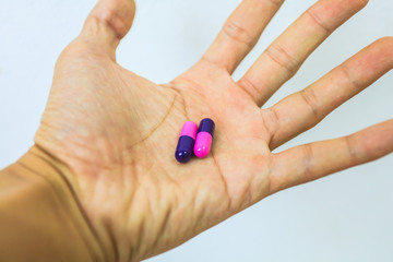 Medicine pills or capsules in hand, palm or fingers. Drug prescription for treatment medication, Health Care Concepts