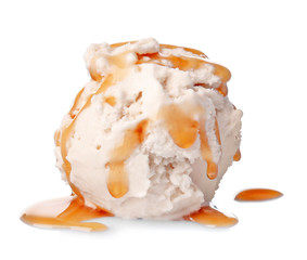 Scoop of ice cream with caramel topping, isolated on white