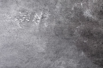 Scattered flour on gray background