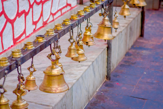 Bells of different size hanging in Taal Barahi Mandir temple, Pokhara, Nepal