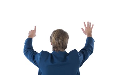 Rear view of businessman using imaginary screen interface